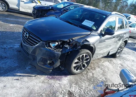 2016 Mazda Cx-5 Grand Touring z USA, uszkodzony, nr VIN JM3KE4DY3G0868464